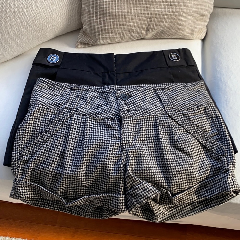 Mini black shorts and black and white shorts